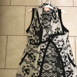 long, sleeveless sweater!